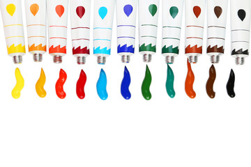Colorful acrylic paints in tubes on white background