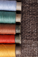 vintage bobbins with colorful threads