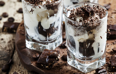 Chocolate dessert with ice cream in a glass, selective focus
