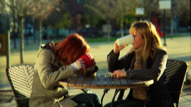 Drinking coffee and chit chatting