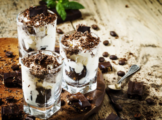 Chocolate dessert with ice cream in a glass, selective focus