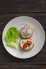 sandwiches with radish, cherry tomatoes and cheese 