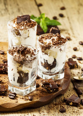 Chocolate dessert with ice cream in a glass, selective focus