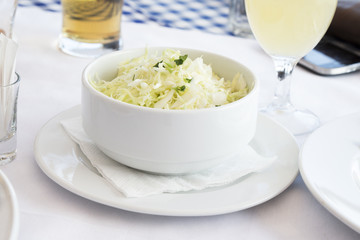 Coleslaw served on restaurant table 