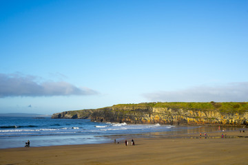 winter walkers on Ballybunion beach