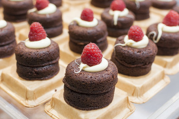 Chocolate cake with cream and Raspberry