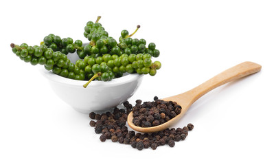Black pepper seeds on white background