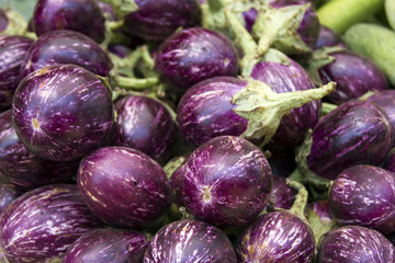 Fresh juicy aubergine on the counter in India Goa