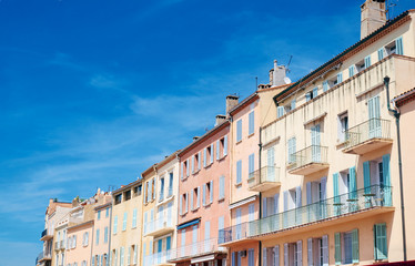 Fototapeta na wymiar Tenement houses in the port of Saint-Tropez, France.