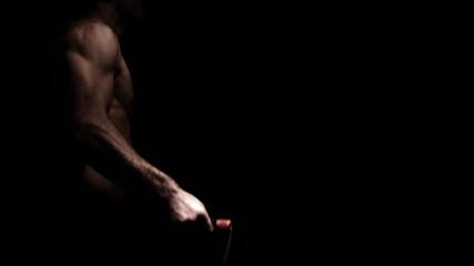 Male athlete jump ropes. Medium shot.