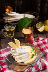 white asparagus served with a fine hollandaise sauce and Poache