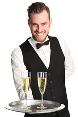 Waiter in his 20s serving champagne wearing a shirt and vest
