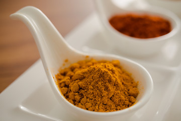 Wooden table of colorful spices