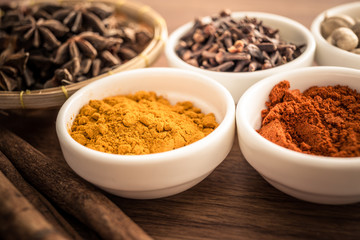 Wooden table of colorful spices