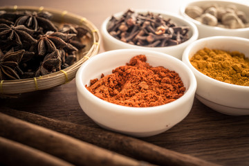 Wooden table of colorful spices