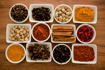 Wooden table of colorful spices