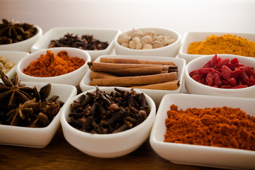 Wooden table of colorful spices