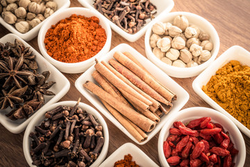 Wooden table of colorful spices