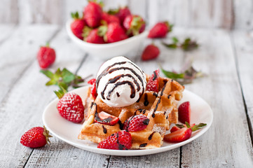 Belgium waffles with strawberries and ice cream 