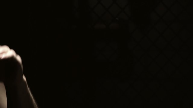 Mixed martial arts athlete runs through his shadow boxing routine