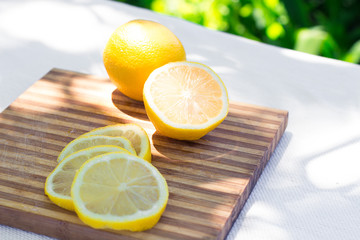 Fresh lemon slices on a cutting board