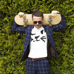 handsome guy in sunglasses and  board