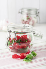 Sweet candies in glass jars