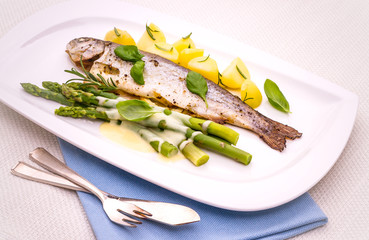 Grilled trout with green asparagus and rosemary potatoes