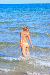 Fototapeta premium woman having fun in the sea