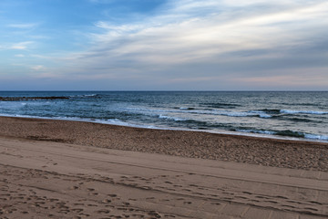 Empty beach at sunset, Santa Severa, Lazio, Italy.