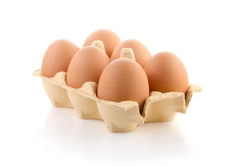 Foto op Plexiglas Six brown eggs in carton on white with clipping path © bajinda