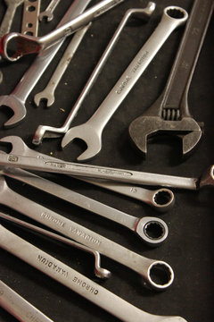 Assorted wrenches in a tool box