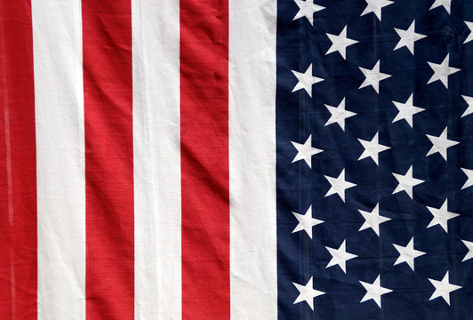 US flag hanging vertically