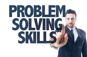 Business man pointing the text: Problem Solving Skills