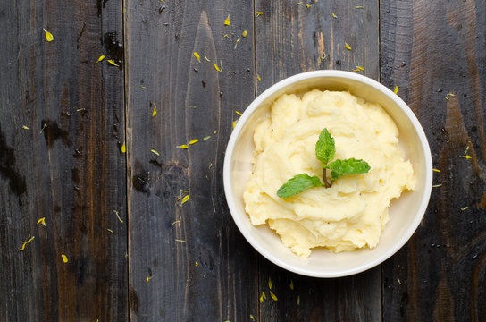 Mashed Potato On Wooden Background