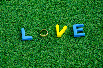 love letter message on green grass background