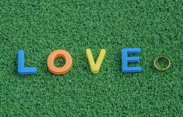 love letter message on green grass background