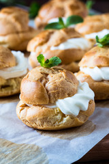 Profiteroles with cream, French dessert