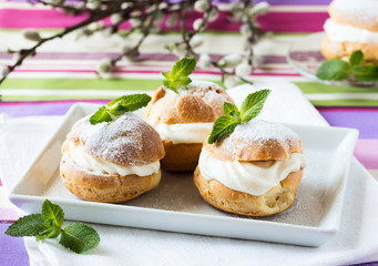 Profiteroles, cream puff, traditional French dessert