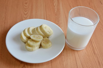 cultivated banana slice and milk glass