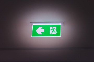 green fire exit light sign