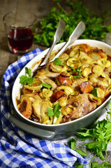 Chicken baked with bread and onion.