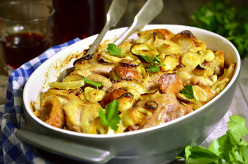 Chicken baked with bread and onion.