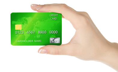 Hand holding credit card, isolated on white