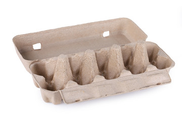 eggs in an egg carton on a white background