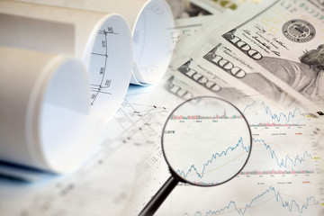 Collage with construction plans, charts and money