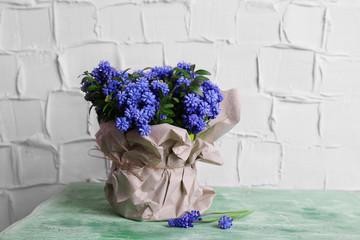 Beautiful bouquet of muscari - hyacinth in vase 