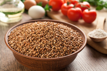Ceramic bowl with buckwheat.