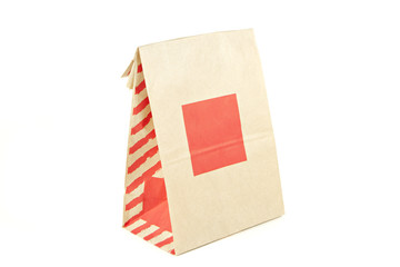 Fototapeta na wymiar Brown paper bag on isolated white