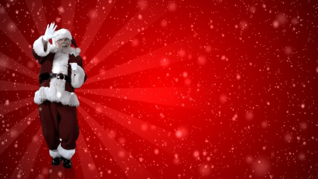 Santa dances next to a Happy Holidays sign